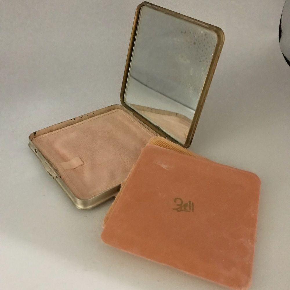 Zell Vintage compact, gold and silver.